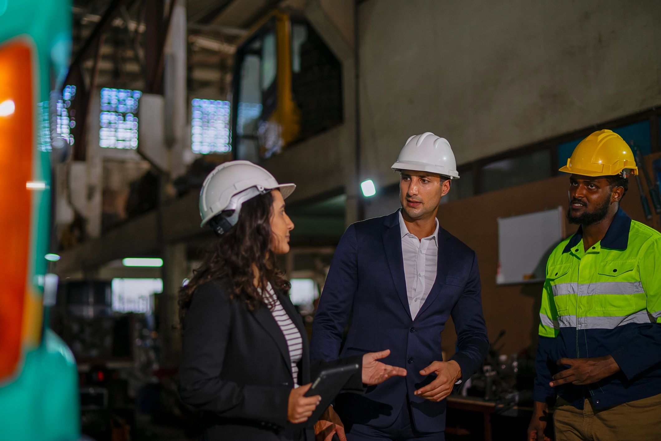 Engineering team reviewing project plans at a construction site